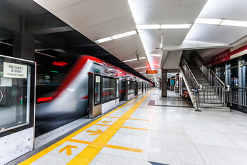 Wall Mural - Moving train in subway station