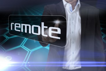 Aufkleber - Businessman pointing to word remote