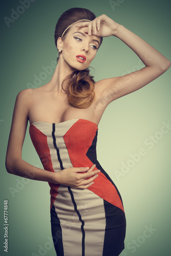 Obraz w ramie fashion female with vogue dress