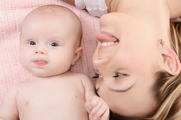 The happy mother with baby