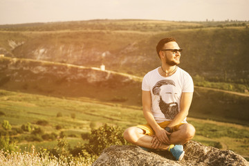 Handsome man outdoors portrait with a retro vintage instagram fi