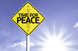 © gustavofrazao - Time for Peace road sign with sun background
