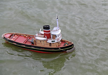 A Radio Controlled Model Of A Tug Boat.
