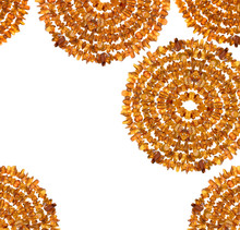 Abstract Composition Of Raw Amber Gemstones On White.