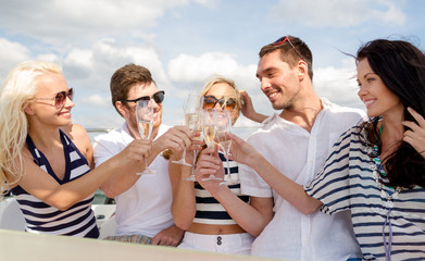 Sticker - smiling friends with glasses of champagne on yacht