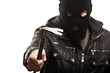 Criminal thief or burglar man in balaclava or mask holding crowb