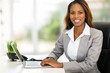 © michaeljung - young african american businesswoman using computer