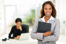 Black Business Woman Holding Clipboard
