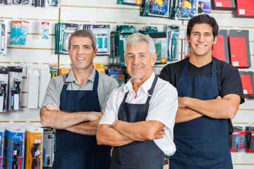 Wall Mural - Confident Salesmen In Hardware Store