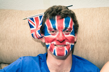 Funny Man With British Flag Painted On Face