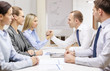© Syda Productions - businesswoman and businessman arm wrestling