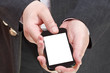 © vvoe - phone with cut out screen in businessman hand