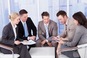 Business People Discussing In Office