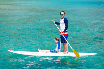 Wall Mural - Father and son paddling