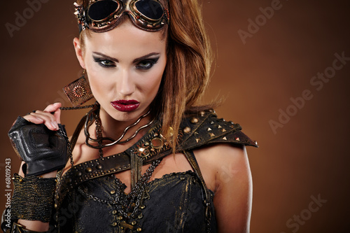 Obraz na płótnie canvas dwuczęściowy "dyptyk" Kobieta steampunk na tle gunge. 