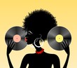 African girl holding two vinyl records