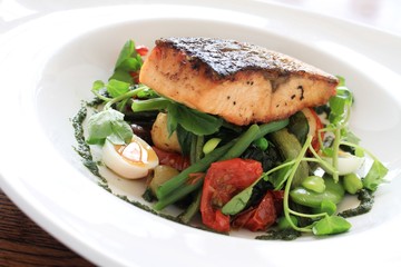 Sticker - pan seared salmon steak with bean salad meal