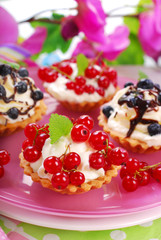 Wall Mural - mini tartlets with whipped cream and fresh fruits