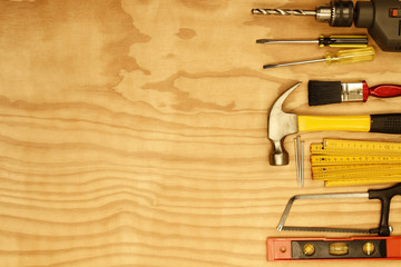 Poster - Work tools on wood background. Copy space