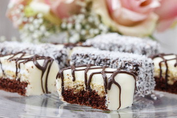 Poster - Chocolate and marzipan cakes on glass cake stand.