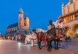 Carriages before the Sukiennice on The Main Market in Krakow
