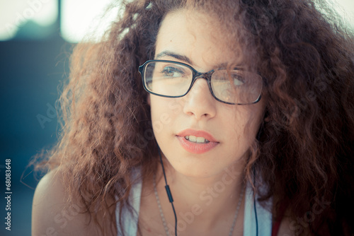 Young Beautiful Long Curly Hair Hipster Woman Listening Music
