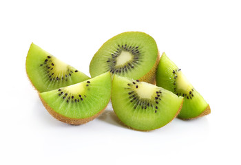 Wall Mural - Whole kiwi fruit and his sliced segments isolated on white backg