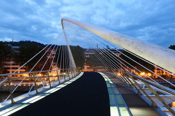 Fototapete - Pedestrian bridge over Nervion river in Bilbao. Spain