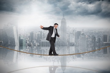 Aufkleber - Mature businessman doing a balancing act