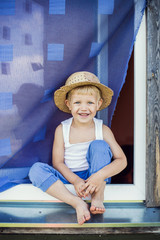 Wall Mural - Young farmer sit on the window sill