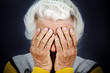 © pathdoc - Closeup portrait depressed old woman covering her face with hand