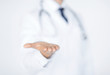 © Syda Productions - male doctor holding something in his hand