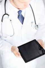 Sticker - male doctor holding tablet pc