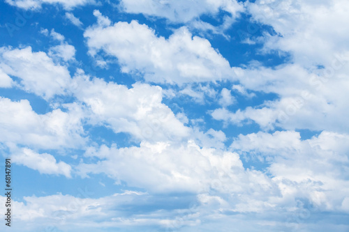 Naklejka ścienna Bright blue cloudy sky background photo texture