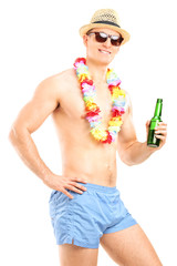 Wall Mural - Shirtless guy holding a bottle of beer