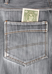 Wall Mural - One dollar bill sticking in the back pocket of denim  black jean