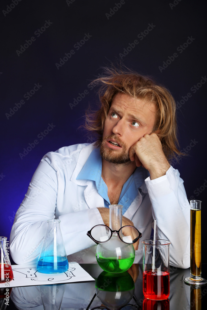Crazy scientist working in laboratory