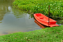 Orange Boat In Lake