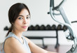 © siraphol - Woman workout at fitness
