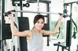 © siraphol - Woman workout at fitness