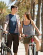 Young couple with bicycles