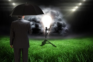 Poster - Composite image of businessman climbing up ladder