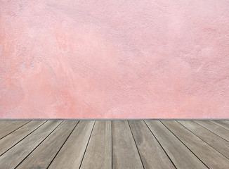 Wooden floor and pastel pink background