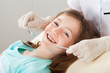 © Andrey Popov - Happy Girl Undergoing Dental Treatment