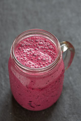 Wall Mural - Blueberry smoothie in a glass jar