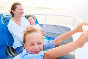 Wall Mural - family enjoying ride on ferry