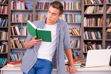 Canvas Print - Reading his favorite book.