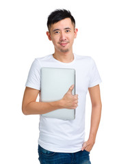 Canvas Print - Asian young man with laptop computer