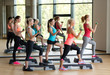 © Syda Productions - group of women with dumbbells and steppers