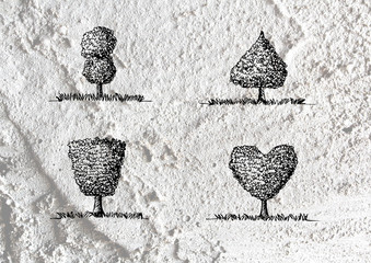 trees with leaves  in silhouettes  on wall texture background de